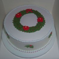 Christmas Wreath Fruit Cake covered in marzipan and RI, with RI wreath and poinsettias