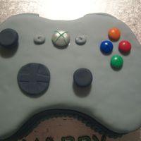 Xbox Control Chocolate cake covered in sugarpaste with sugapaste and M&M details.