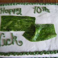 Money Cake chocolate cake with buttercreme icing. Money is MMF that I did freehand.