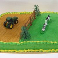 John Deere Cake This is the first cake I've ever sold!!! Yay, me!! John Deere cake devil's food, buttercreme icing.