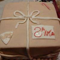 Santa's Package I was inspired by all the wonderful cakes in the galliery.I see some1 else made this also..I'm still very new to this...