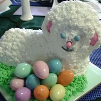 Easter Lamb Bc icing with fontant for the eyes ,ears and nose.Eggs filled with candy