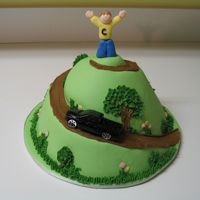 King Of The Hill Birthday Cake This was for my brother, who is very interested in environmental work, running, and his new truck. Decorations are in fondant, and the...