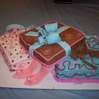 Birthday Presents I am just startindg at this. My first attempt with fondant accents. It was for my sister, she loved t.One cake was vanilla with blueberry...