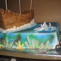 Chase's Pirate Ship First time making a pirate ship. B/C and fondant. Birthday Boy loved it! I did forget to add windows. Next time I'll try to add more...