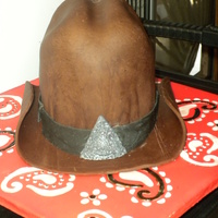 Dude It's A Hat The kids ate the hat, the brim and licked the royal icing off the board. I didn't see it but they must have been hungry.