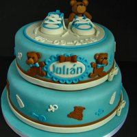 Blue For A Boy! For Julian, a babyshower cake with "boyish" colours, loved making it. The little sneakers were so much fun to make and I was very...
