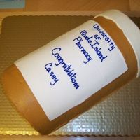 Graduation From Pharmacy buttercream covered with fondant for the perscription label