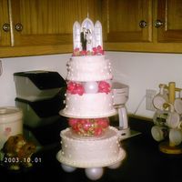 My First Wedding/tiered Cake Attempt I have a couple people that has asked me to start charging for cakes. I thought I would attempt a tiered cake and this is it. I still can&#...