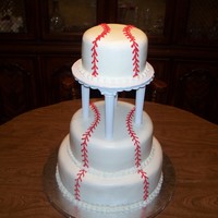 Baseball Wedding Cake I don't know who to credit the original design to - I made this to simulate a picture the couple provided. This was made for my son&#...