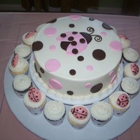 Mod Ladybug Shower Cake Buttercream with fondant accents. Candymelt ladybugs on cupcakes.