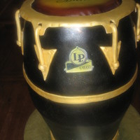 Conga Cake For a neighbors father-in-law who plays the congas in a band. Bottom was a 6" dummy, 2 (8") on top.