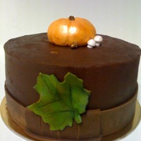 Autumn/ Thanksgiving Cake A tiny 6 inch round chocolate cake with chocolate ganache and fondant accents. Pumpkin, Acorn, mushroom, and leaf are all buttercream...