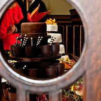 Chocolate Cups Groom's Cake Chocolate cups are filled with layers of chocolate mousse and dark chocolate cake, and garnished with chocolate sticks and chocolate...