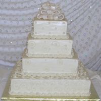 Ivory Wedding Gifts All buttercream icing with edible pearls. Fondant bow dusted with super pearl dust. I am sad to say that the bride was unhappy with this...