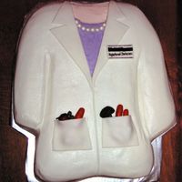 Dietician's Graduation Cake This is a fun cake for a girl who loves her veggies! Buttercream frosting and fondant details and vegetables.