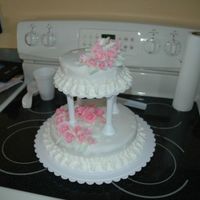 Course 3 Final Cake 2 tier, fondant covered, BC border with tons & tons of handmade roses. Loved making this cake although it took 4ever.