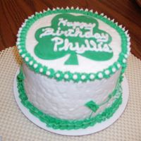 Shamrock Cake This is a cake I made for my sister's birthday. It is a white cake with green food coloring for the occasion. Covered with BC and a...