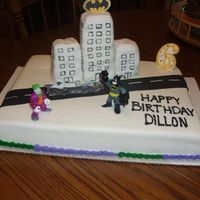 Batman This is for my grandson's 6th birthday. I wasn't happy with the way it turned out, my 1st try at covering rice krispie treats,...