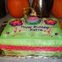 Tinker Bell White cake with BC icing. Tinker Bell cake topper in the middle.