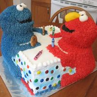 Elmo And The Cookie Monster I was asked to do this cake for the 1yr old.Let me tell you,this cake was sooooo much work.Holly Cow.And it weighed a ton.On the way to the...