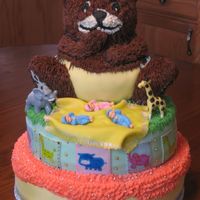 Baby Shower Bear Cake made for the baby shower for the three pregnant women. First tier yellow cake w/ vanilla forsting. Second tier carrot cake w/ cream...