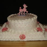 Poodle Cake Found the poodle topper from Birthday Express. I'm not very good with flowers, so I just used artificial. Just snip off the stems and...