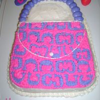 Coach Purse Pink and Purple Coach Purse, fingernail polish and key chain and key.