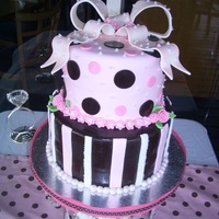 Bridal Shower Cake Two tiered double layered cakes covered in fondant with gumpaste bow. This bow was a challenged and it took forever to dry, it was my first...