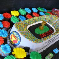 Cars Movie International Speedway Cake Double 9x13 covered with fondant and buttercream dots for the car audience. This cake was fun to make and had alot of personality when I...