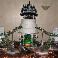 This Was My Daughters Wedding Cake This was a cake that took some thought, I found this cake topper that is 14" at the base and was 14 1/2" high. My daughter had to...