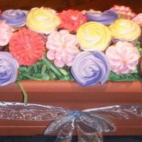 Cupcake Flower Bouquet This was my first attempt at a cupcake bouquet. I never even used these tips before, but thanks to all the flower cupcakes that came before...