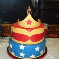 Wonderwoman Cake tiara done with gumpaste and fondant mix, figure on top was bought.