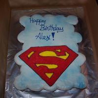 Superman Cupcakes Cupcake cake! Sky look background with a large Superman S! The kids loved it. I star tiped the S since I could not get it smooth but I...
