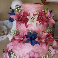 Pink Passion A tropical themed reception and the bride LOVES pink. chocolate cake with MMF colored with pink and silver. You can't really see the...