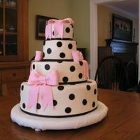 Polka Dots This was actually a graduation cake for a neighbor's daughter who saw a picture of it. It is a copy of a design done by Mary-Clee...