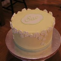 Birthday Cake 8 inch cake with fondant and royal icing flowers made for a friend's birthday.