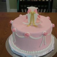 Baby-Girl-Cake-01.jpg Cake for someone expecting a baby girl. Fondant and gumpaste accents.