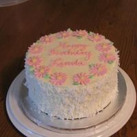 Linda-S-Cake-004.jpg Birthday cake for a friend. Toba's moist yellow cake with lemon curd/lemon buttercream filling and IMBC.