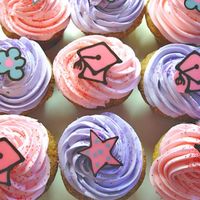 Graduation Party Cupcakes Cupcakes featuring graduation-themed decorations created in chocolate....