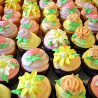 Wedding Cupcakes Wedding cupcakes featuring an assortment of buttercream fantasy flowers.