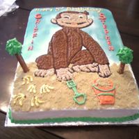 Curious George The Monkey The picture was traced by hand onto the cake and filled in with BC frosting.