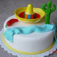 Mexican Cake Dummy cake covered in fondant. Cactus, sombrero and chili pepper made in gumpaste.