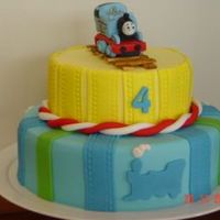 Thomas The Train Engine Cake Dummy cake covered in fondant. Thomas was made in gumpaste. I made this cake for my 4 year old son. He adores Thomas. I plan on making a...