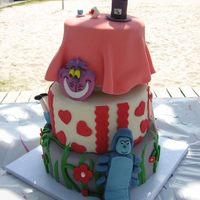 Alice In Wonderland This was got a 9 yr olds party. Top was vanilla w/vanilla BC, middle was chocolate w/ choco bc, and bottom was strawberry w/vanilla bc. All...