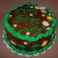 Birthday Cake 2 layer yellow cake w/ chocolate decadent filling and icing. MMF accents