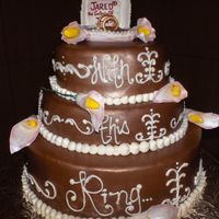 With This Ring 3 tiered cake that a local major jewelry store asked me to make for their Diamond Event and of course I was very eager to do this. Bottom...