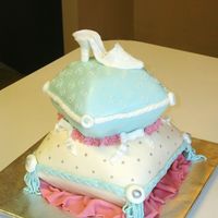 Cinderella Pillow Cake With Slipper Cinderella pillows with slipper - This was a chocolate fudge cake covered in fondant. This was my first try at a shoe and my second attempt...