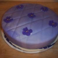 Violet Baby Shower Cake Made a mini cake for a baby shower theme was purple and violets.I marbled the fondant with purple and white and the violet flowers are...