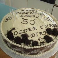50Th Birthday Cake This was a chocolate cake I made for my Brother-in-law's 50th birthday. Had bavarian cream in the middle and then iced with...